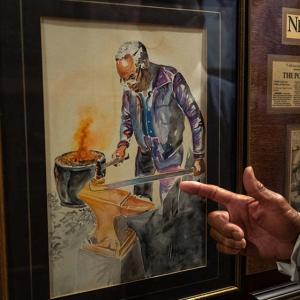 Illustration of Bowden's grandfather working as an iron worker