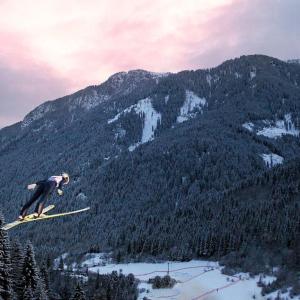 Ski jumping down a mountain