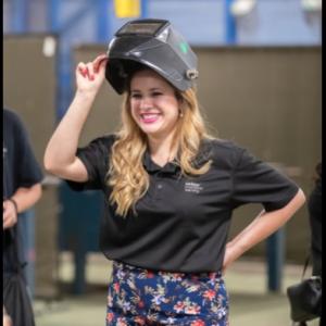 Brenda wearing a VR helmet