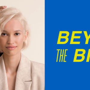 A hair stylist with a client. " Beyond the Brand"