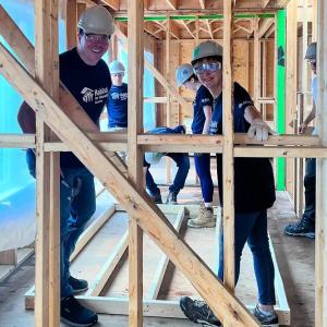 Volunteers inside a home being built.