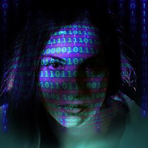 A person with digital coding projected on to them