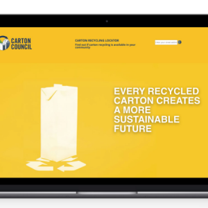A laptop screen in yellow "Every recycled carton creates a more sustainable future".