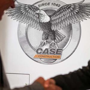 2 people shaking hands in front of a CASE logo