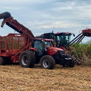 two tractors in a field