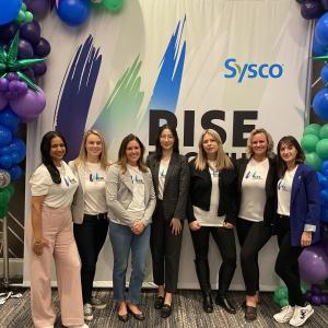 Seven people standing together