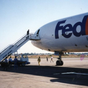 A FedEx plane on a tarmac