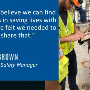 Quote from Chris Brown next to an image of a person in high-vis clothing checking a tablet.