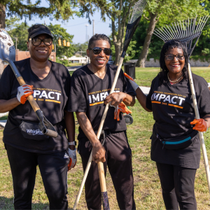 three people with garden tools