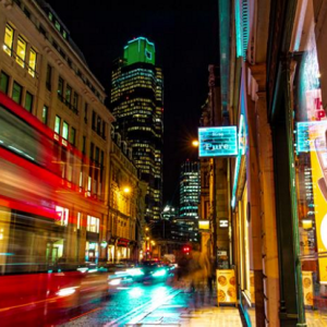 Photo of a city with a blurred image of  bus