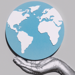 Hand holding a globe
