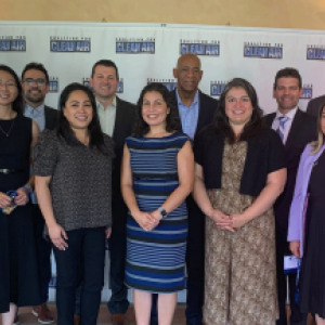 A group of people posed in doors.