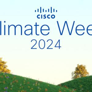 "Climate Week 2024" over a landscape of hills and trees.