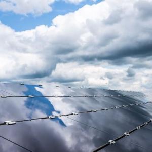 Clouds reflected in solar panels