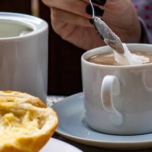 a cup of coffee and pastry