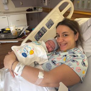Baby and parents celebrating Fifth Third Baby