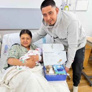 Baby and parents celebrating Fifth Third Baby