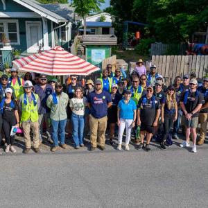 A group of people standing outside