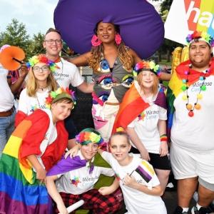 Group of LGBTQ community  members celebrating at Pride parade