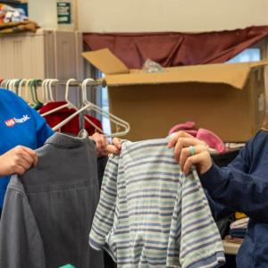 U.S. Bank employees Rebecca Stichter (left) and Nicci Balzer volunteer at Humility Homes & Services, Inc., which supports people experiencing housing insecurity in the greater Quad Cities area.