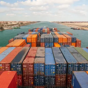This 2017 file photo shows loaded containers stacked on a cargo ship in the Suez Canal. Shipping in the area has become more challenging recently, including for shipments sent by Direct Relief to healthcare facilities in Yemen and Sudan. (Photo by Camille Delbos via Getty Images)