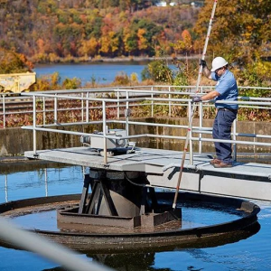 Worker at a wastewater treatment plant