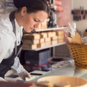 Woman working at a bakery