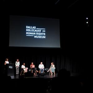 A group of presenters on stage, a large digital screen behind them "Dallas Holocaust and Human Rights Museum."