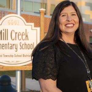 Dawn Martesi stood outside of Mill Creek Elementary School 
