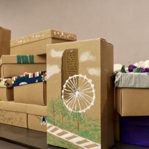 large stack of decorated boxes