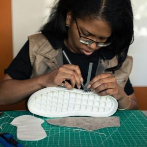 Shavonn working on a shoe design