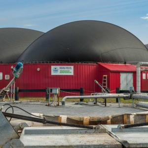 Two large domed buildings. "Vanguard Renewables" on the side.