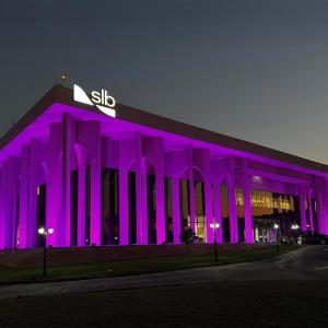 slb building lit up in purple
