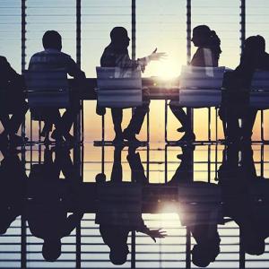 group of people sitting at table