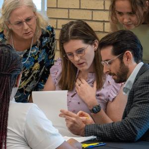 people working at event