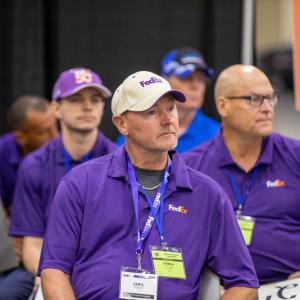 fedex drivers watching a presentation