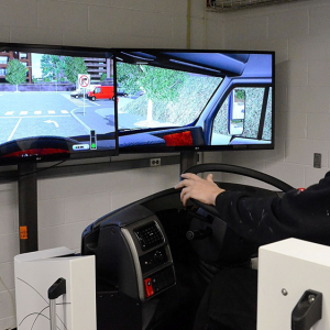 Student using driving simulator