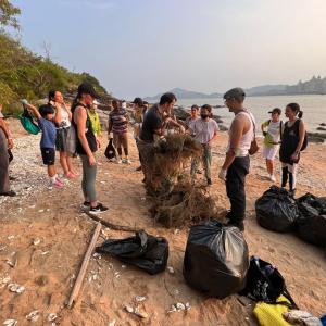 People cleaning up a beach