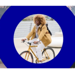 Earth Month, powering sustainable journeys. A person on a bicycle is central.