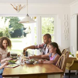 Family eating a meal at the table