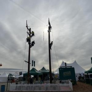 two power line poles on display at the world ag expo