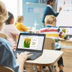 Students on laptops in a classroom