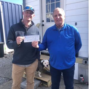 Receiving donation check