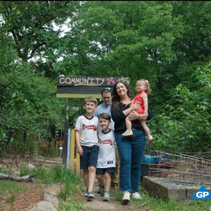 group of people walking on a trail