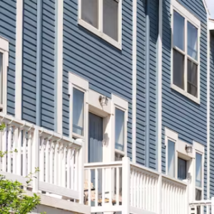 Housing development with blue sky and trees
