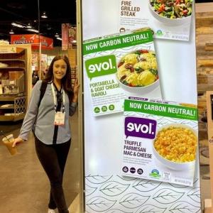 Emily standing in front of board