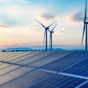 A row of flat solar panels and three wind turbines.