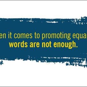 Yellow words against abstract blue paint "When it comes to promoting equality, words are not enough." Duke energy logo in the corner