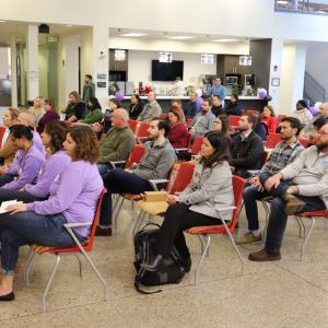 A room of seated people.