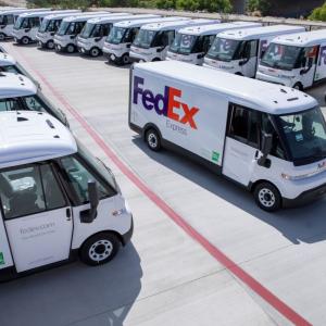 FedEx electric vehicles in parking lot